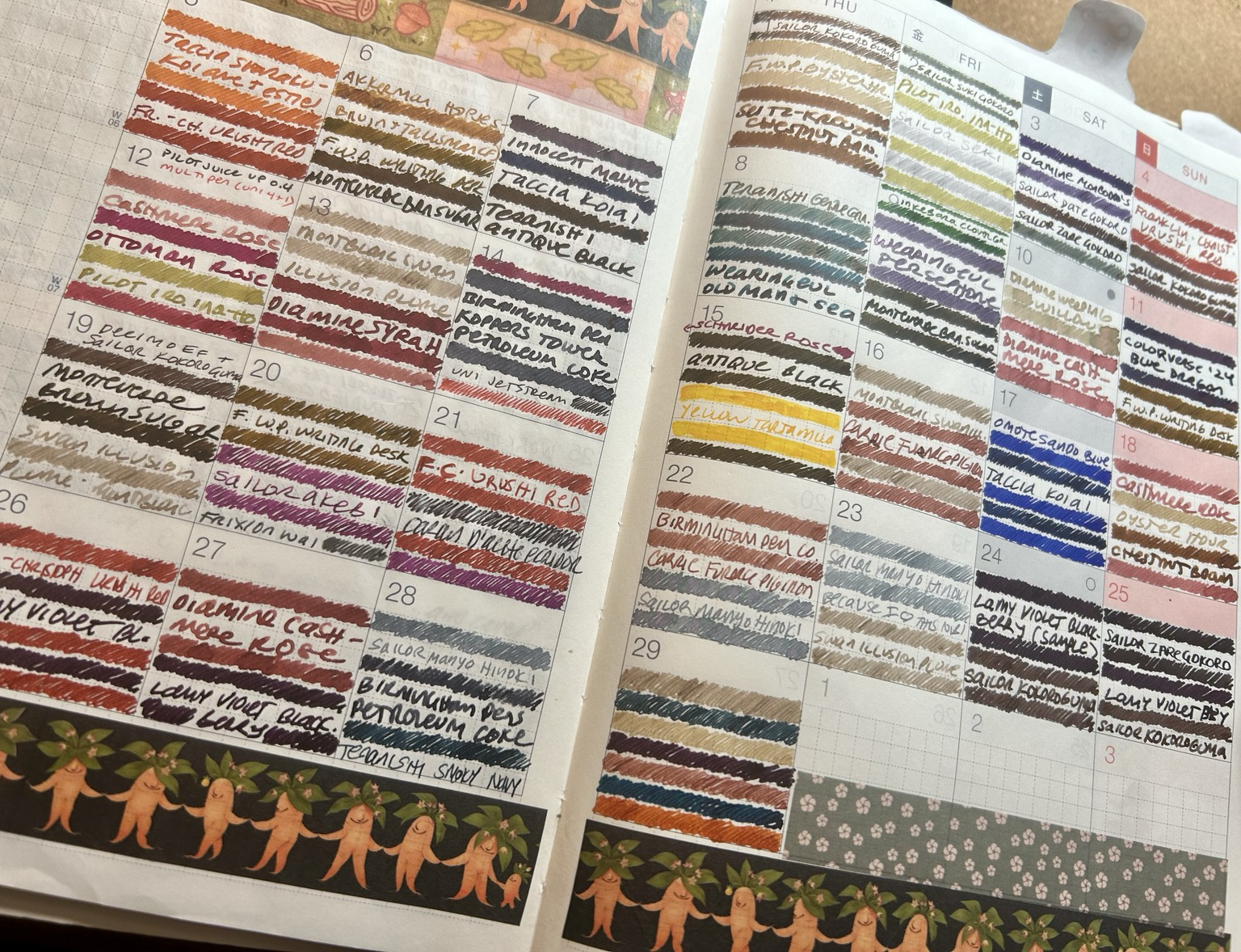 Monthly calendar with colorful fountain pen ink swatch stripes in every box